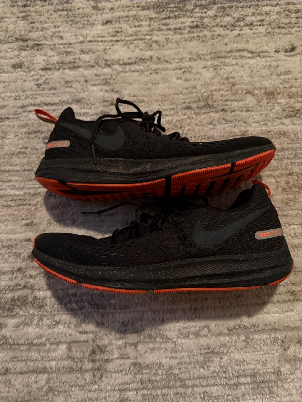 Nike Black and Orange Running Sneakers with Subtle Swoosh